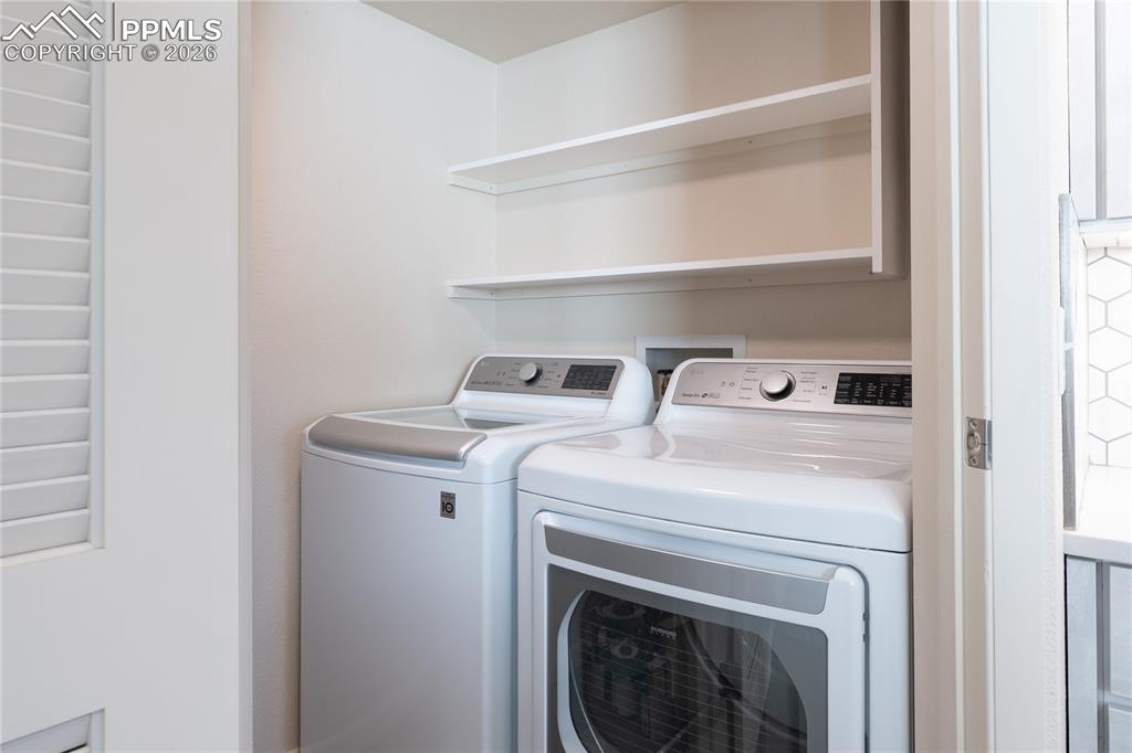 1082 Fontmore Road, Unit D Colorado Springs, CO 80904 - Photo 9 of 32 Laundry Room & Pantry Shelving (not pictured...opposite side from the washer & dryer)