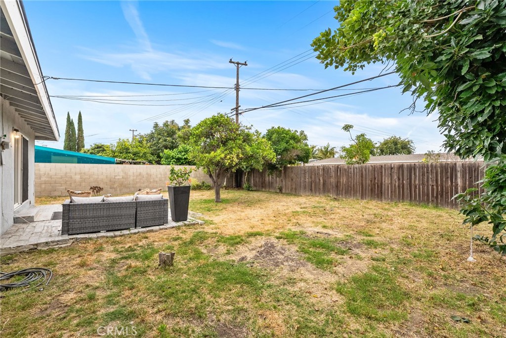 13361 Roxey Drive Garden Grove, CA 92843 - Photo 31 of 31 a backyard of a house with lots of green space