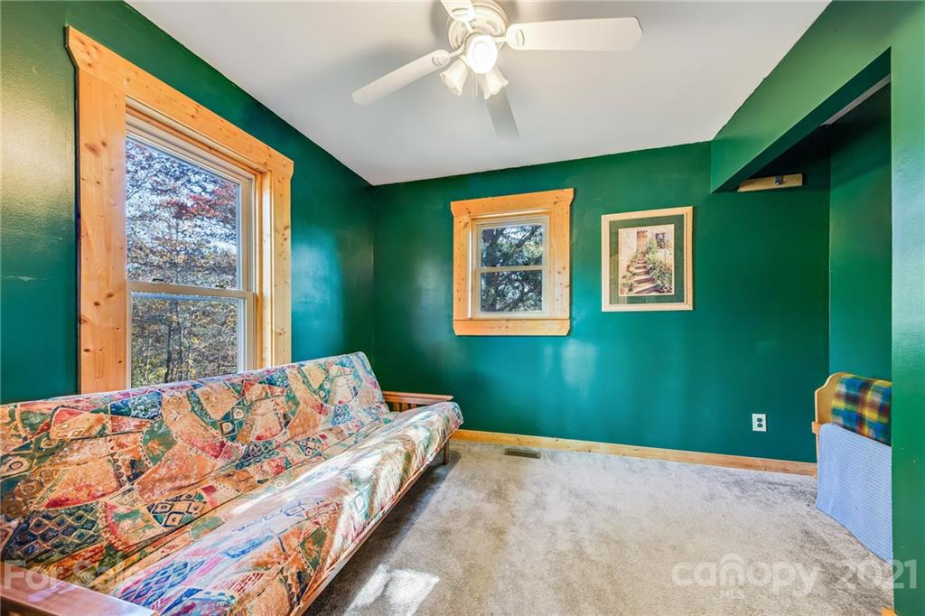 976 Freemantown Road Rutherfordton, NC 28139 - Photo 13 of 23 a bedroom with a bed and a window