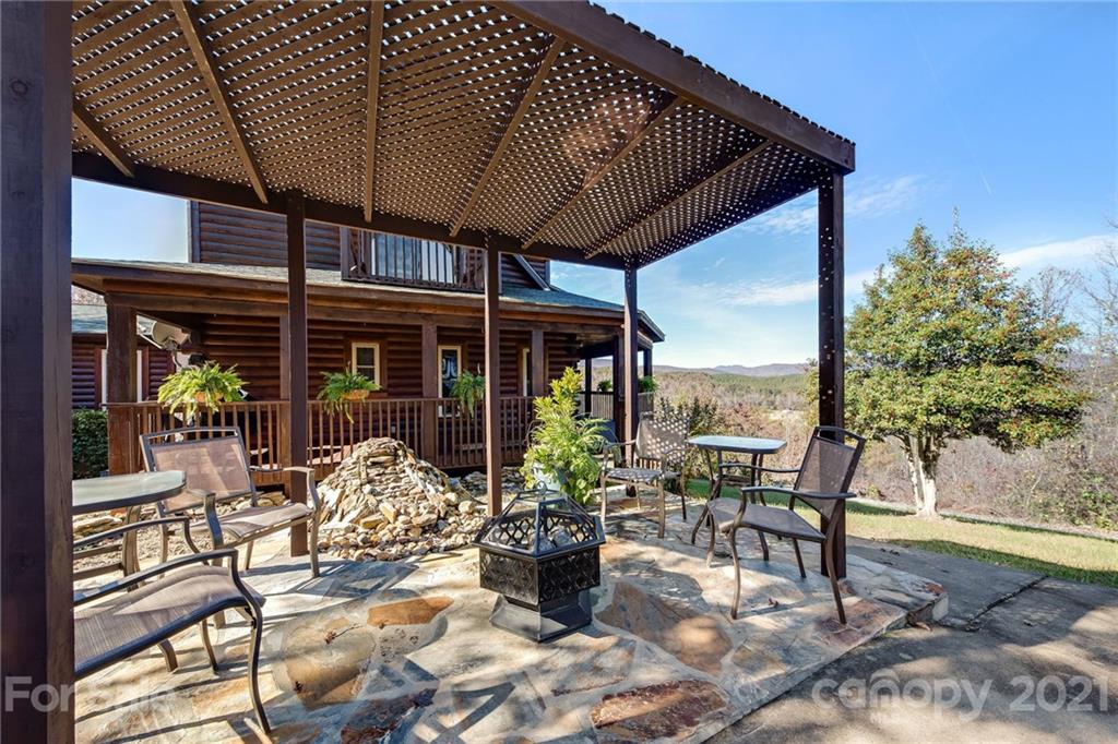 976 Freemantown Road Rutherfordton, NC 28139 - Photo 19 of 23 a building outdoor space with patio furniture and potted plants