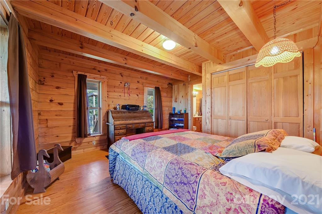 976 Freemantown Road Rutherfordton, NC 28139 - Photo 10 of 23 a bedroom with bed and a mirror