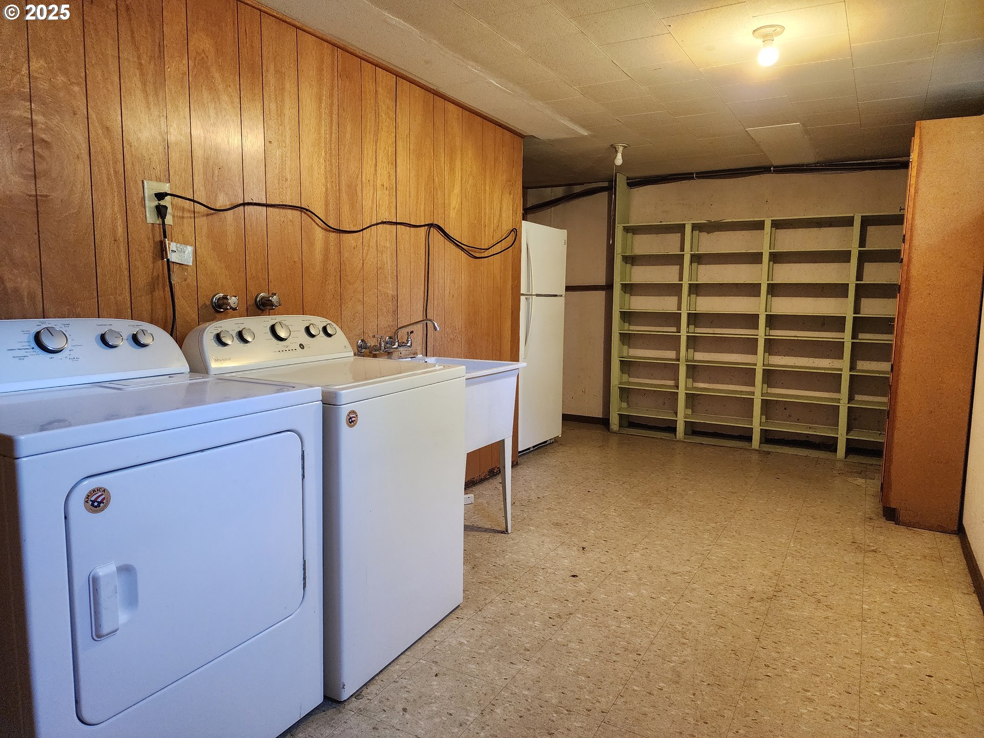 4081 Hawthorne Avenue Northeast Salem, OR 97301 - Photo 16 of 25 a view of storage and utility room with washer and dryer