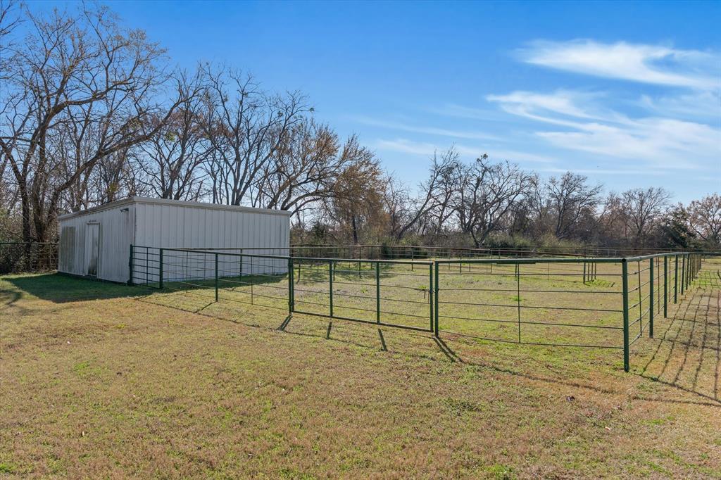 1910 Goodnight Boulevard Wills Point, TX 75169 - Photo 34 of 37 a view of backyard and basketball court