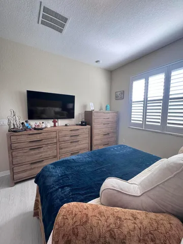 a bathroom with a sink double vanity and a mirror