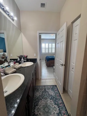 a bathroom with a toilet and a sink