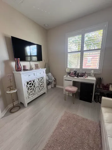 a view of road with parked cars