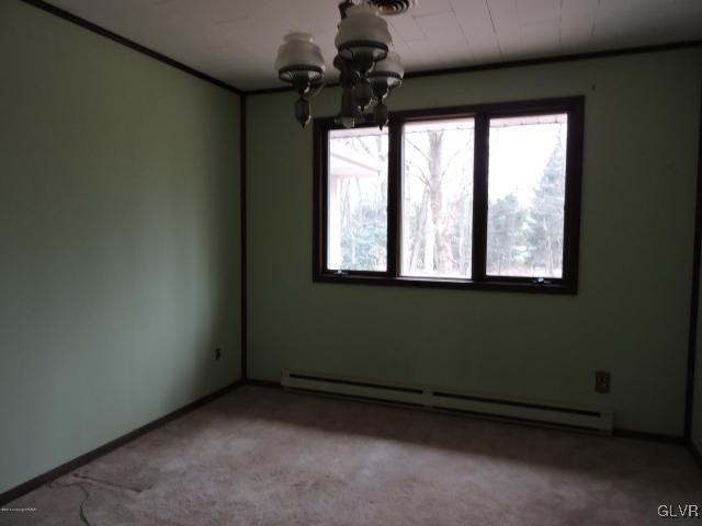 191 Hobby Acres Road Kunkletown, PA 18058 - Photo 4 of 15 a view of an empty room with a window