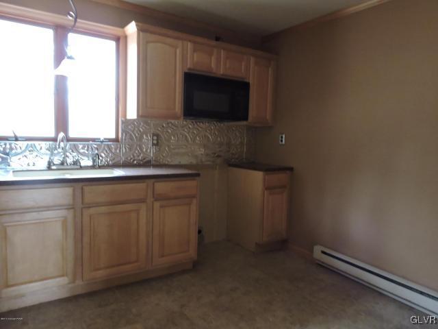 191 Hobby Acres Road Kunkletown, PA 18058 - Photo 5 of 15 a kitchen with a sink and a microwave