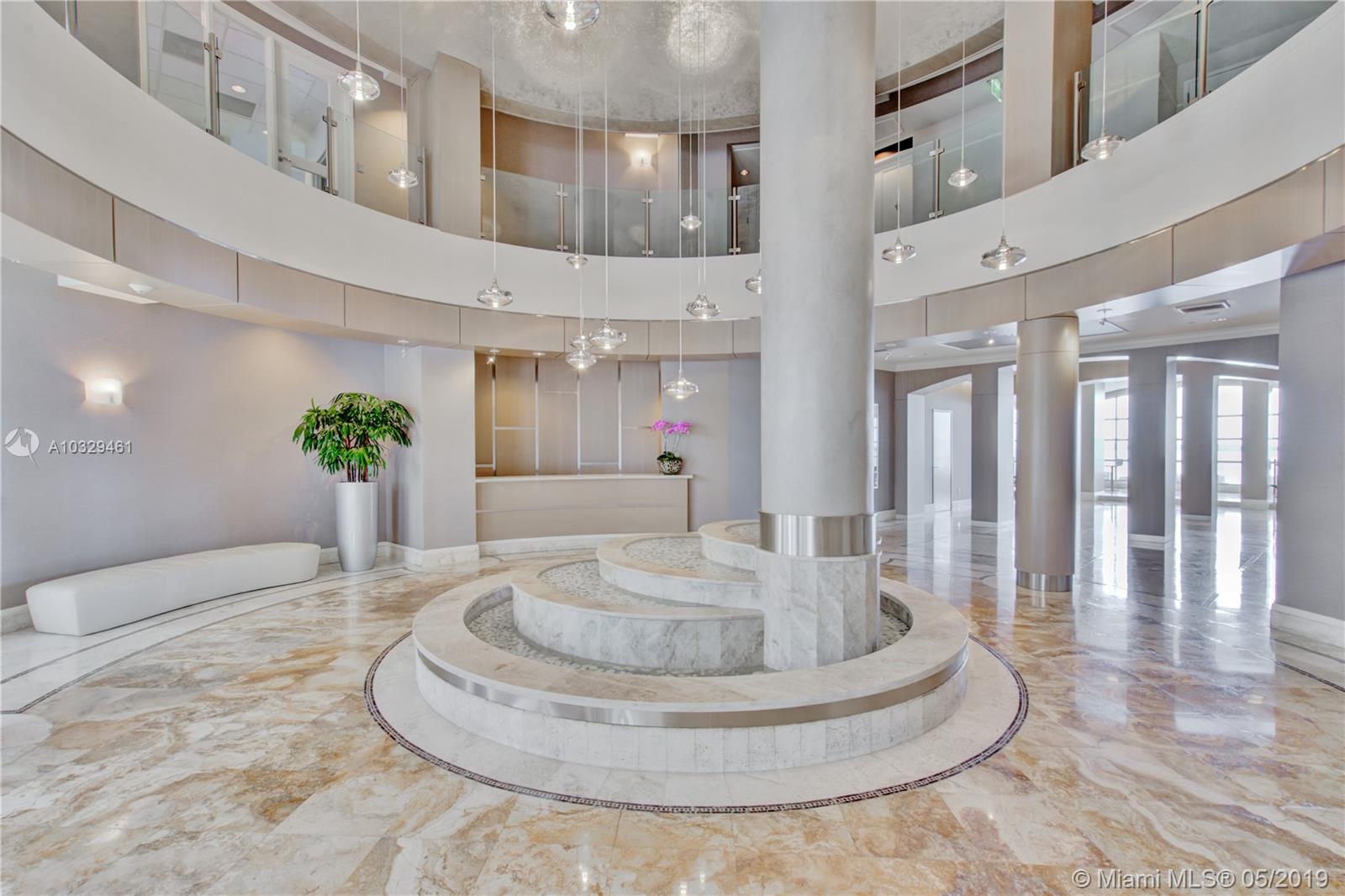 808 Brickell Key Drive, Unit 802 Miami, FL 33131 - Photo 26 of 48 Your new lobby at Two Tequesta Point.