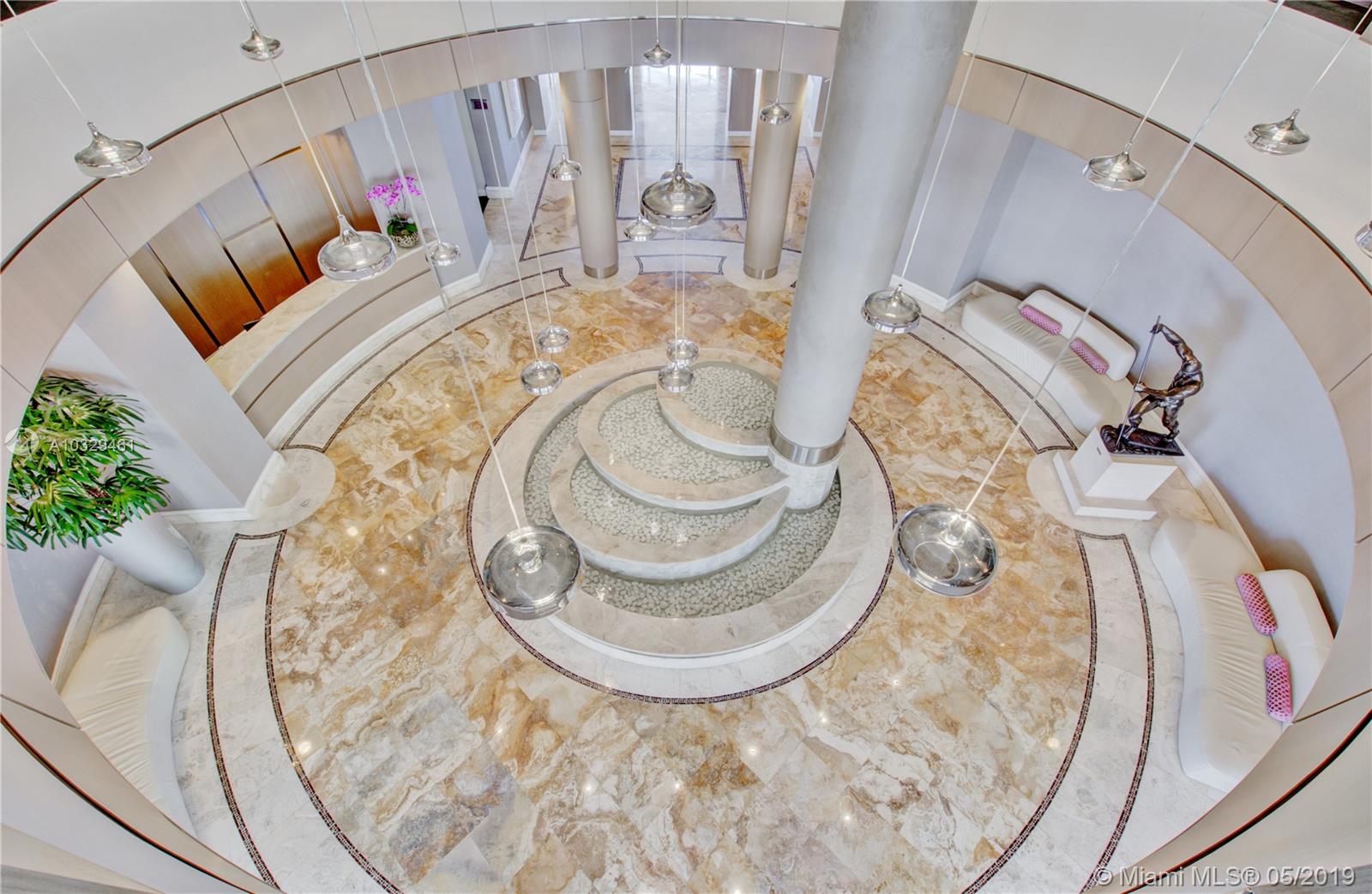 808 Brickell Key Drive, Unit 802 Miami, FL 33131 - Photo 27 of 48 Your new lobby at Two Tequesta Point.