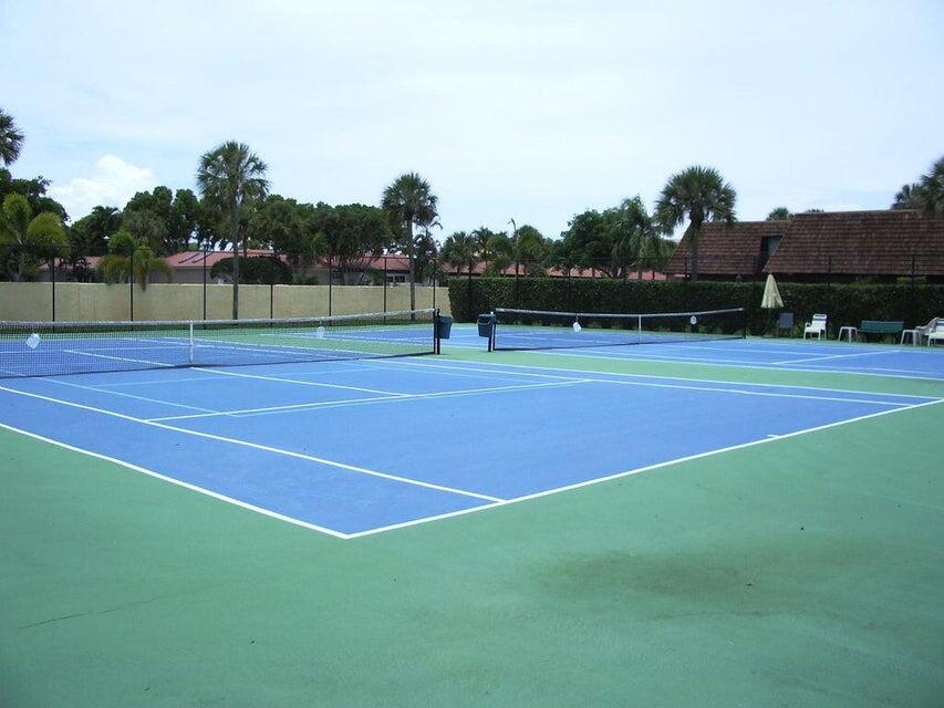 1420 Ocean Way, Unit 14D Jupiter, FL 33477 - Photo 33 of 34 a view of tennis court