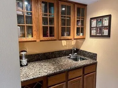 a bathroom with a sink and a window