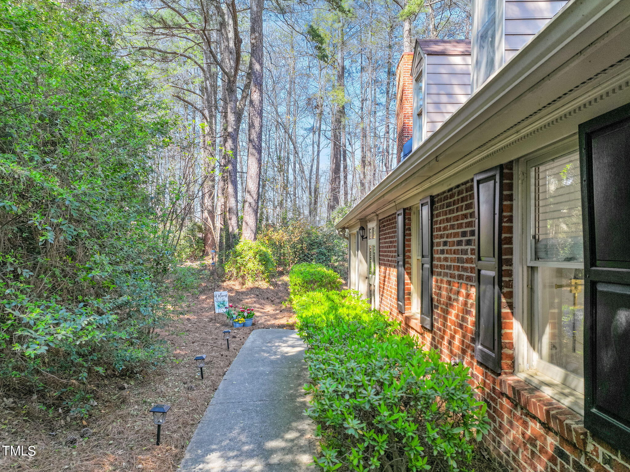 5674 Hamstead Crossing Raleigh, NC 27612 - Photo 3 of 43 4-web-or-mls-DJI_20240319192525_0329_D