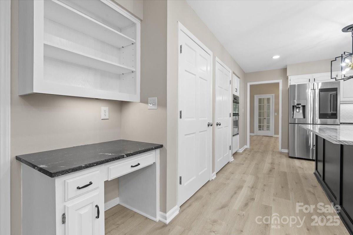 5916 Cashion Road Huntersville, NC 28078 - Photo 17 of 45 a kitchen with white cabinets and sink
