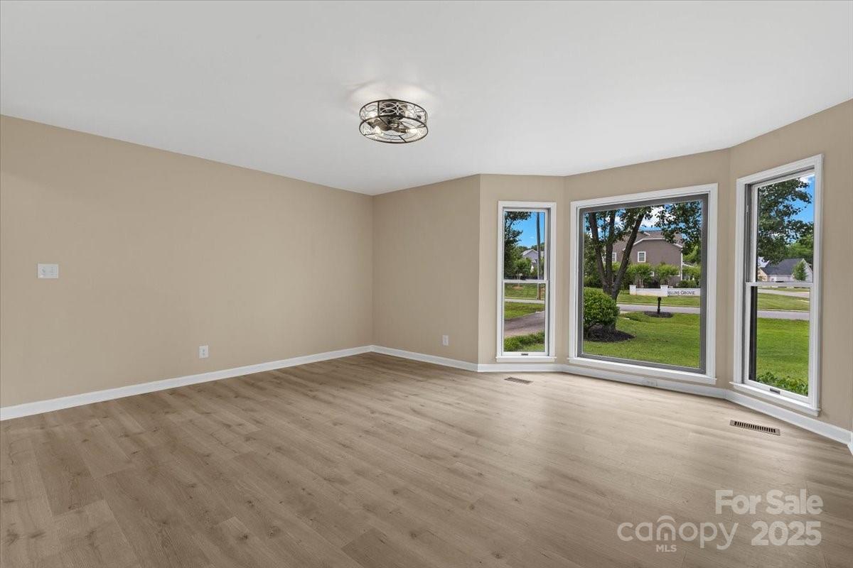 5916 Cashion Road Huntersville, NC 28078 - Photo 23 of 45 a view of an empty room with a window