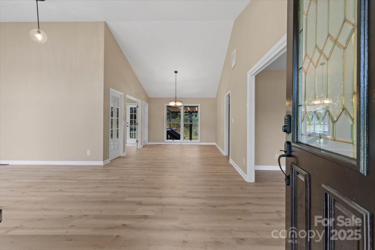 5916 Cashion Road Huntersville, NC 28078 - Photo 3 of 45 a view of an entryway with wooden floor
