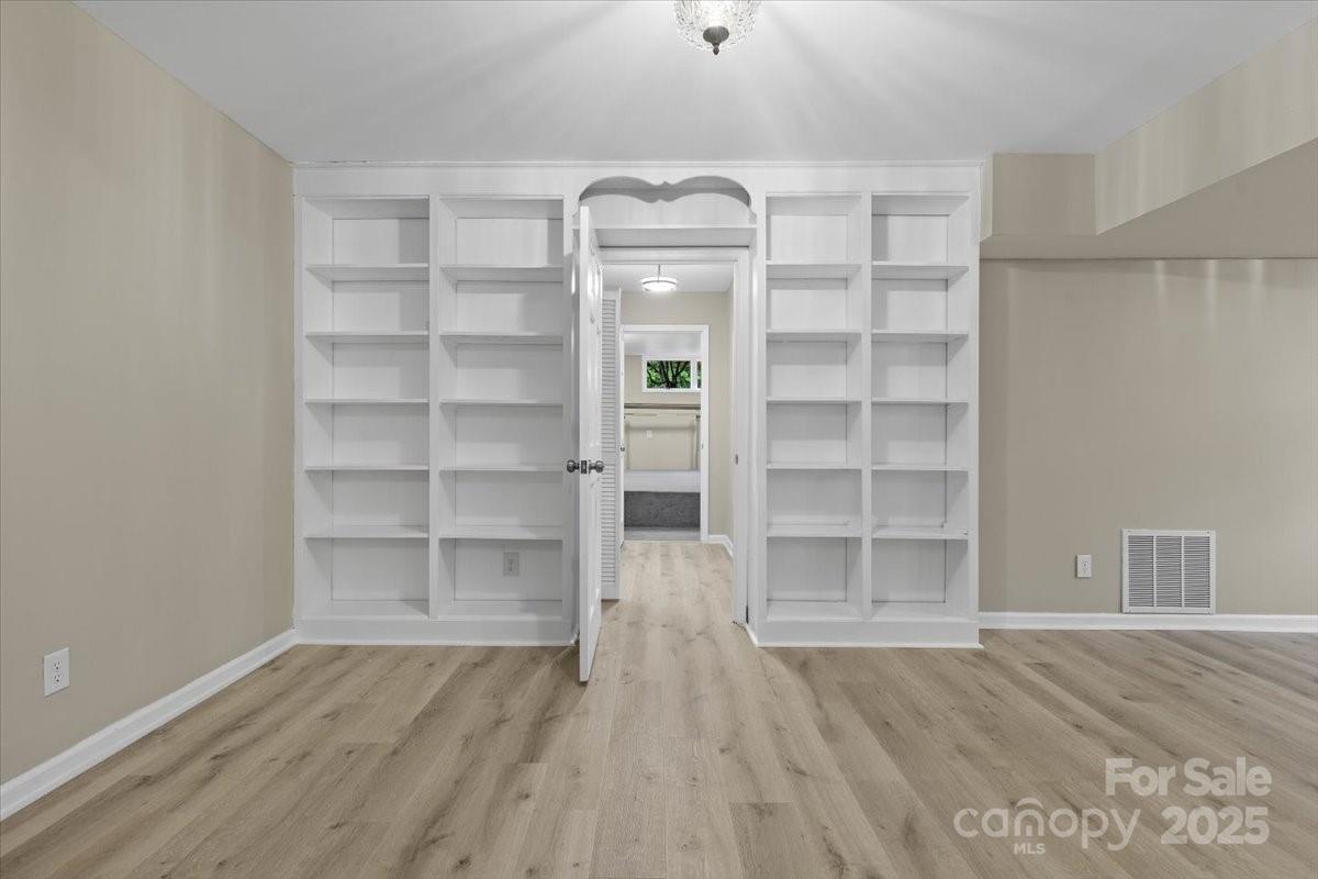 5916 Cashion Road Huntersville, NC 28078 - Photo 37 of 45 a view of a livingroom with wooden floor and closet