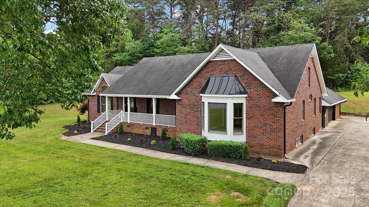 5916 Cashion Road Huntersville, NC 28078 - Photo 41 of 45 a aerial view of a house with a yard patio and slide