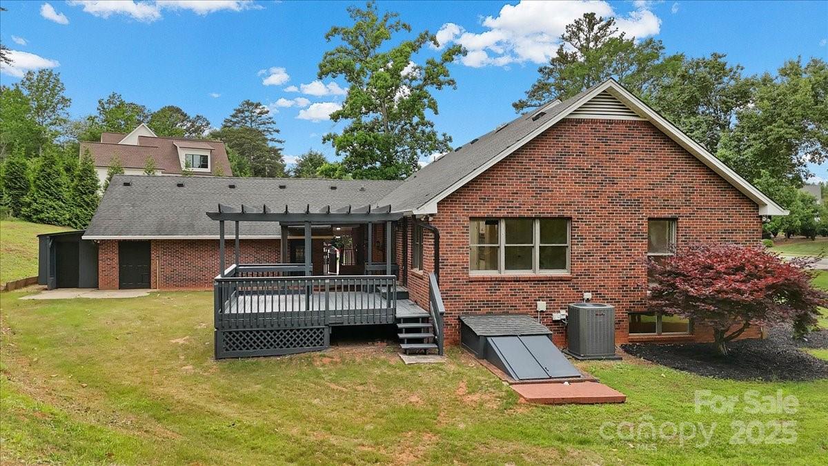 5916 Cashion Road Huntersville, NC 28078 - Photo 42 of 45 a view of a house with backyard porch and sitting area