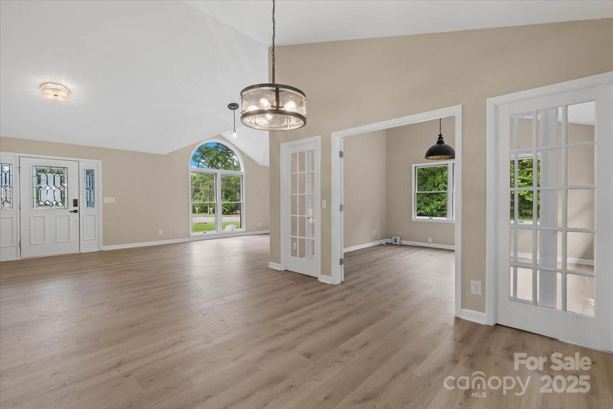 5916 Cashion Road Huntersville, NC 28078 - Photo 6 of 45 a view of livingroom with hardwood floor and window