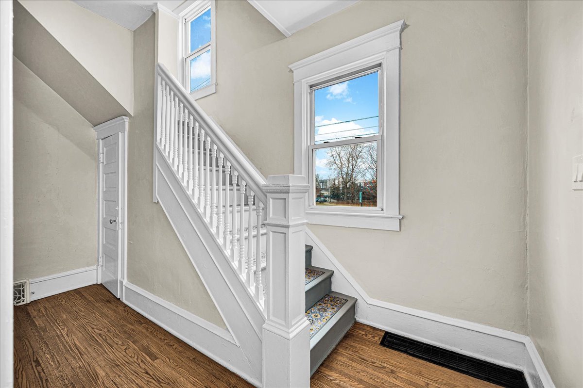 1018 North Prairie Street Bloomington, IL 61701 - Photo 13 of 49 a view of entryway and hall with wooden floor