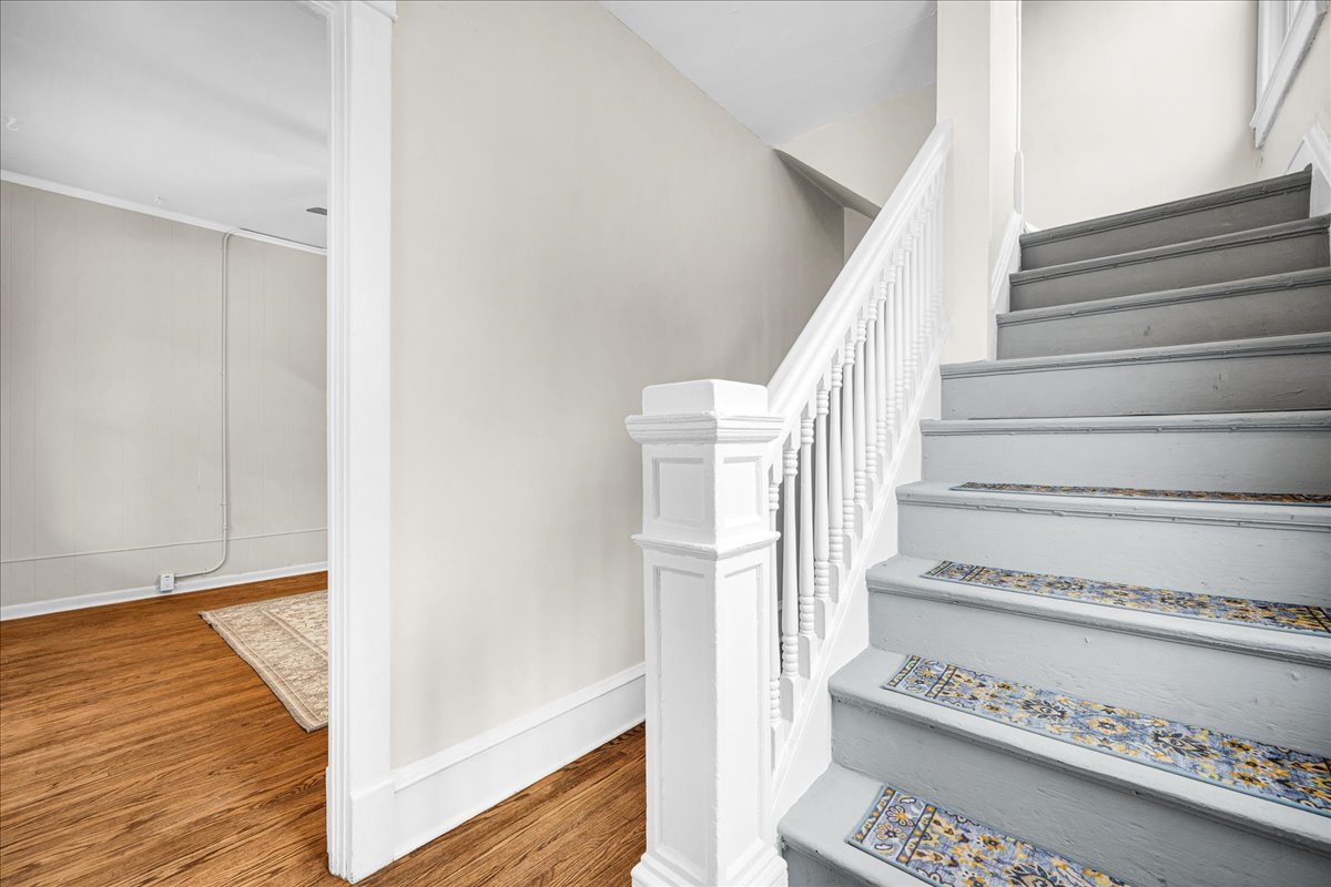 1018 North Prairie Street Bloomington, IL 61701 - Photo 14 of 49 a view of staircase with white walls and white walls