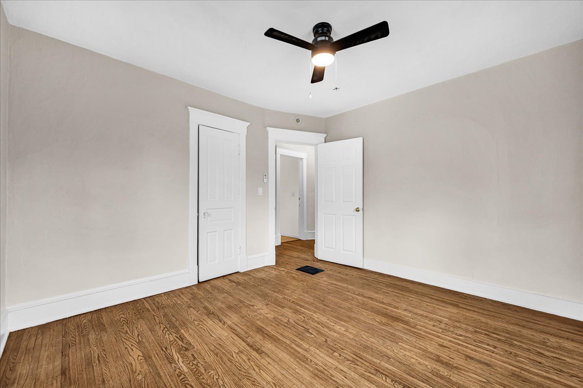1018 North Prairie Street Bloomington, IL 61701 - Photo 25 of 49 wooden floor in an empty room