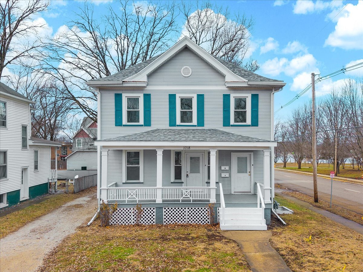 1018 North Prairie Street Bloomington, IL 61701 - Photo 33 of 49 a front view of a house with a yard