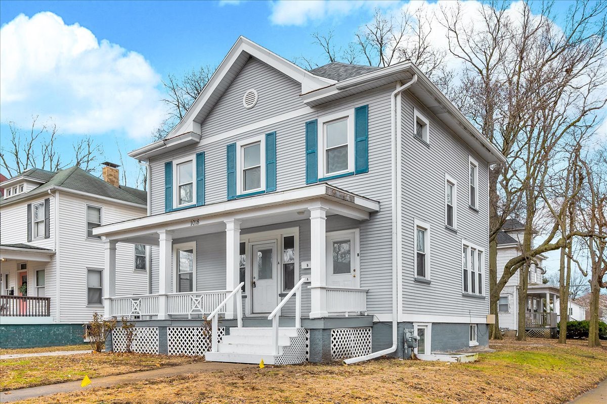 1018 North Prairie Street Bloomington, IL 61701 - Photo 34 of 49 a front view of a house with a yard