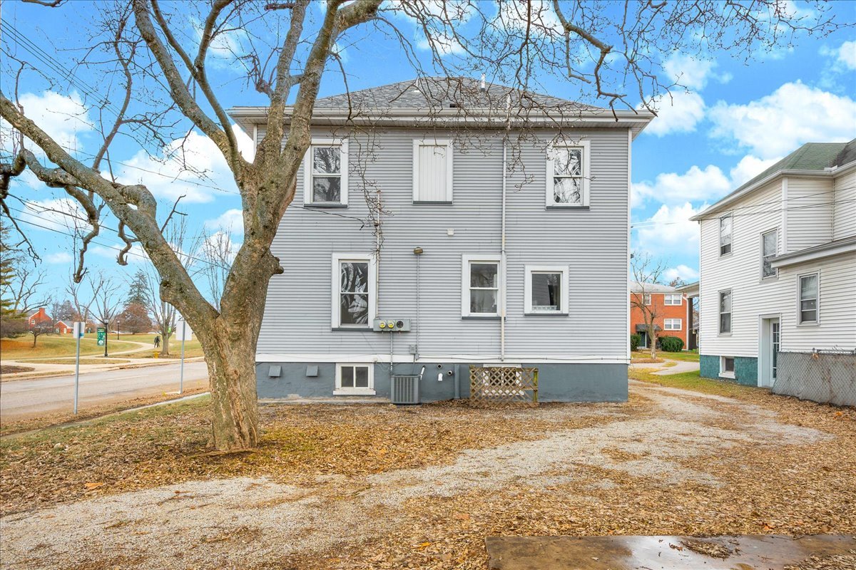 1018 North Prairie Street Bloomington, IL 61701 - Photo 36 of 49 a front view of a house with a yard