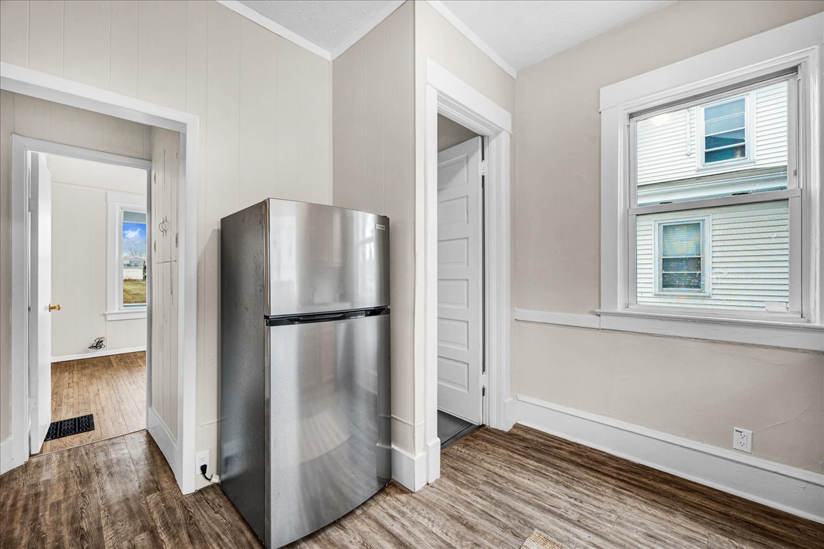 1018 North Prairie Street Bloomington, IL 61701 - Photo 7 of 49 a kitchen with stainless steel appliances a refrigerator and a stove