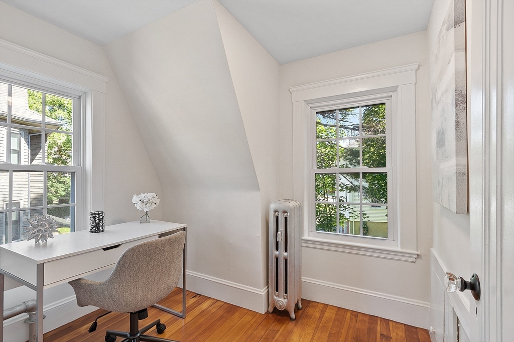 15 Marion Road Watertown, MA 02472 - Photo 18 of 41 a workspace with furniture and a window