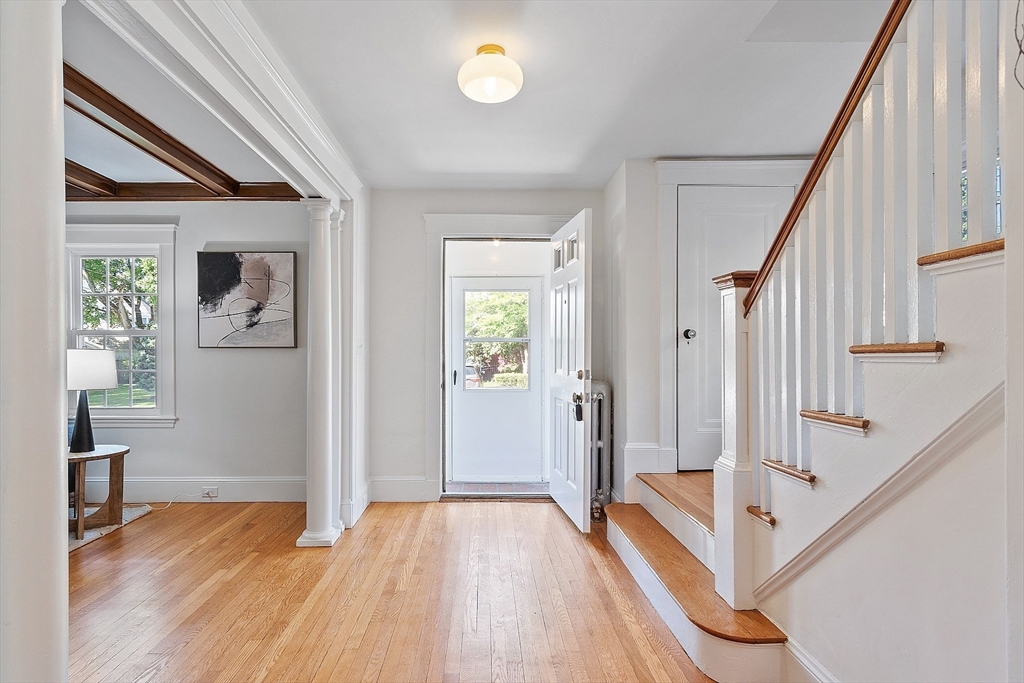 15 Marion Road Watertown, MA 02472 - Photo 2 of 41 a view of an entryway with wooden floor and livingroom