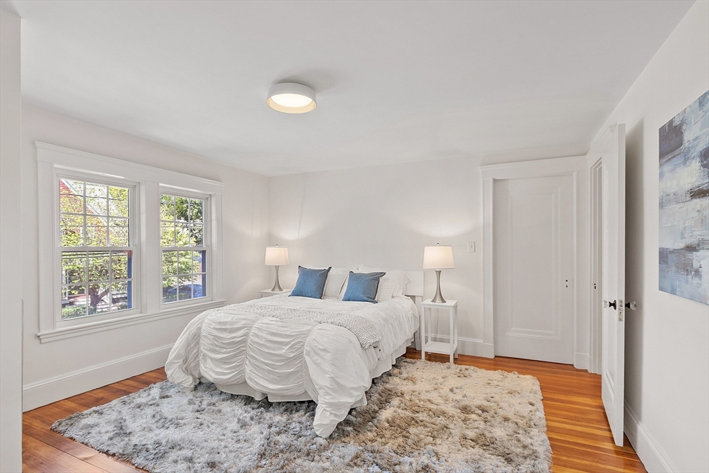 15 Marion Road Watertown, MA 02472 - Photo 24 of 41 a bedroom with a bed and a window