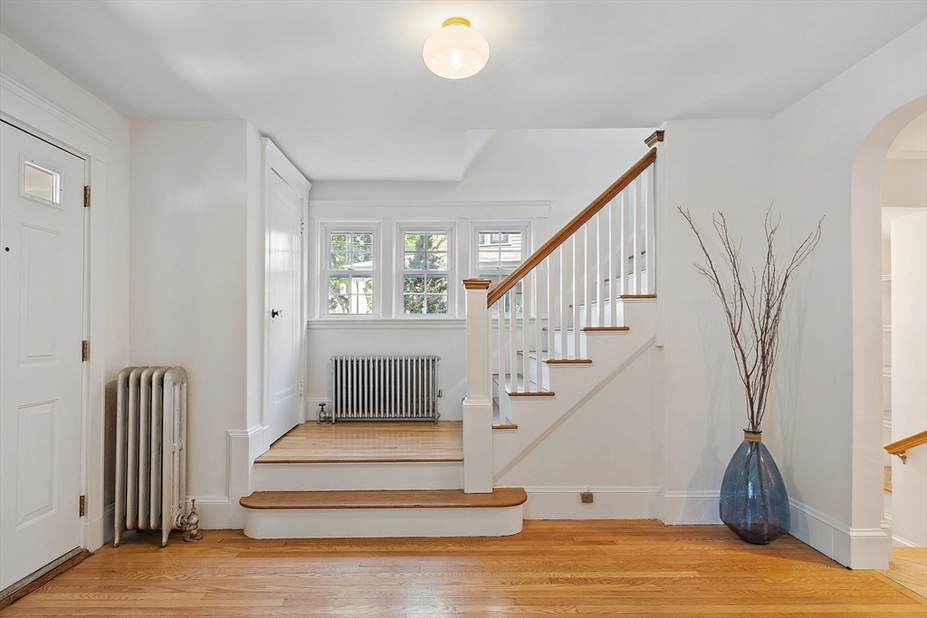 15 Marion Road Watertown, MA 02472 - Photo 3 of 41 a view of entryway livingroom and hall with wooden floor