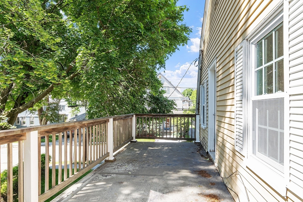 15 Marion Road Watertown, MA 02472 - Photo 33 of 41 a view of balcony with wooden floor and fence