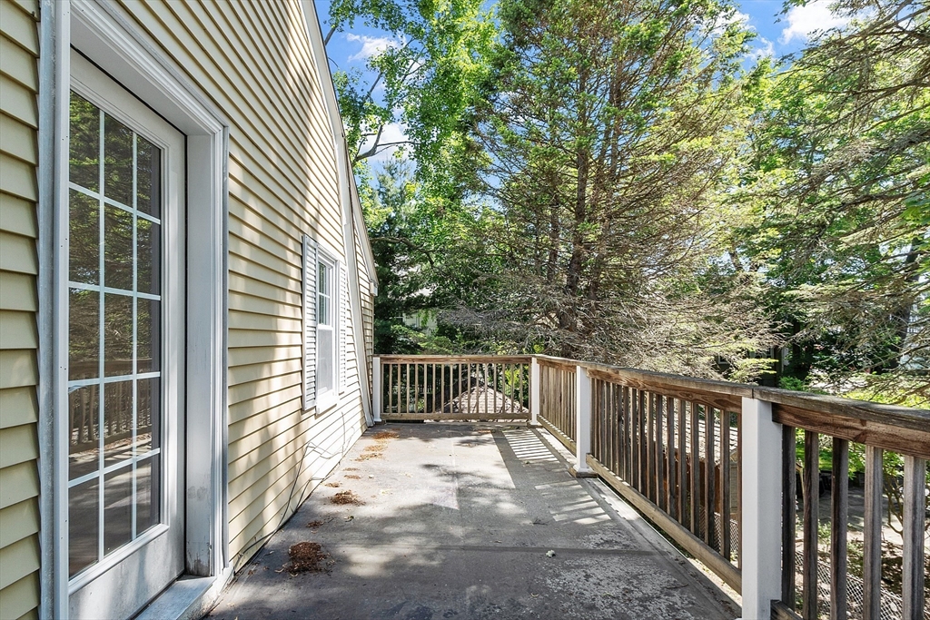 15 Marion Road Watertown, MA 02472 - Photo 34 of 41 a view of balcony with wooden floor and fence