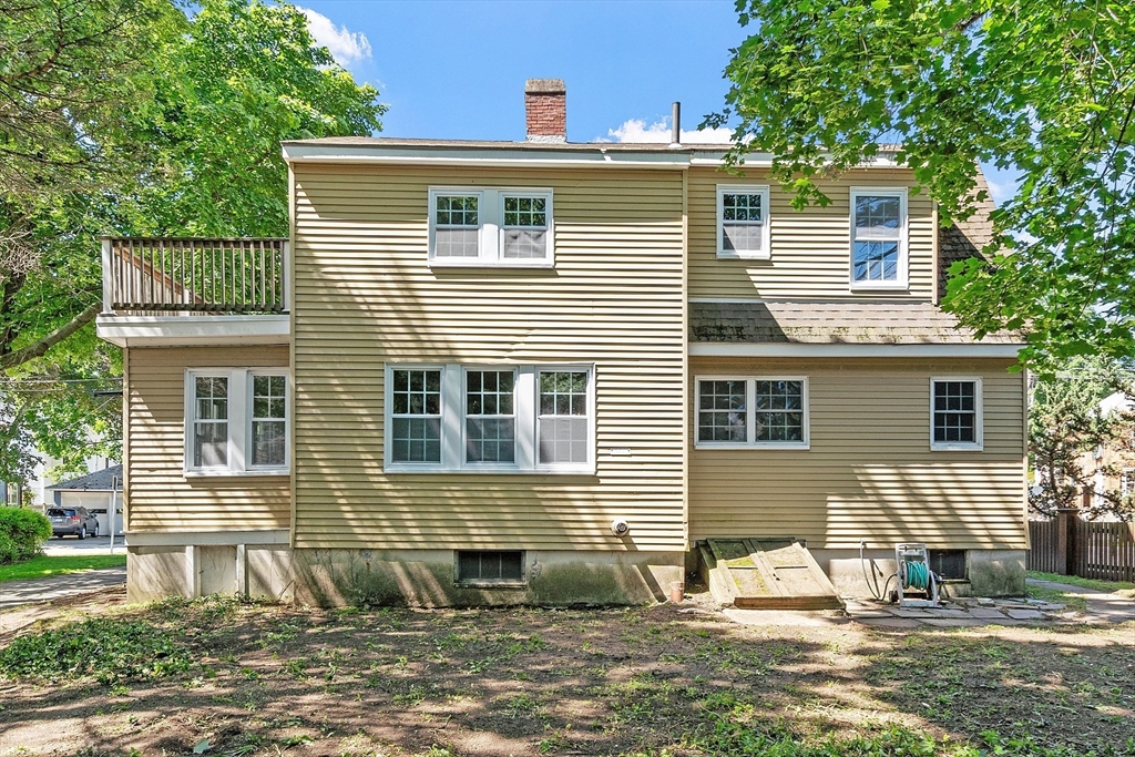 15 Marion Road Watertown, MA 02472 - Photo 35 of 41 a view of a house with a yard and large tree