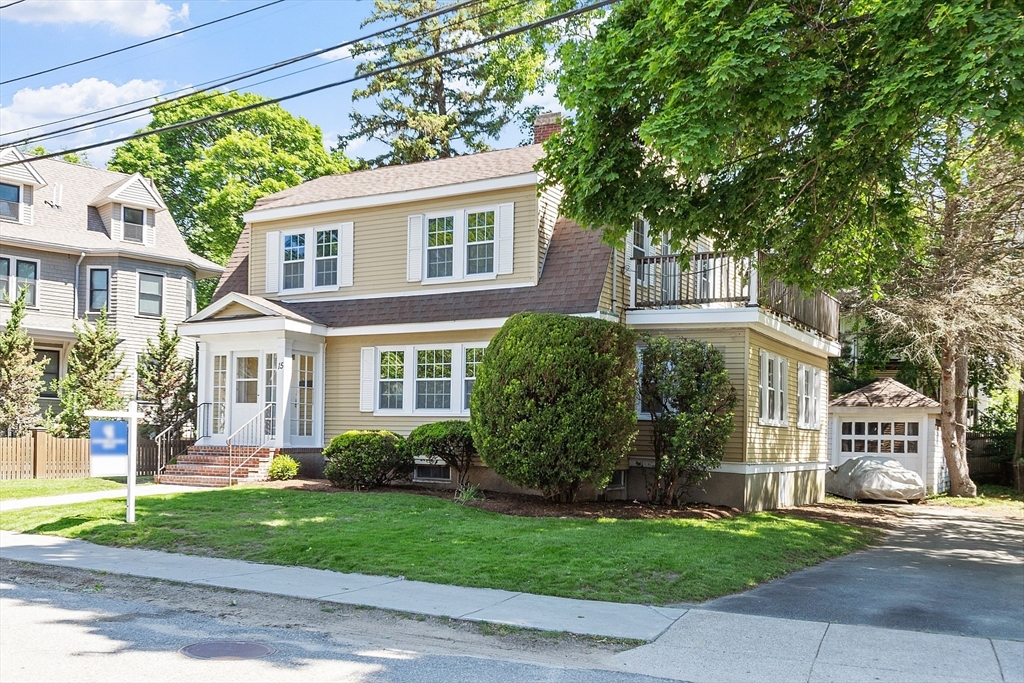 15 Marion Road Watertown, MA 02472 - Photo 41 of 41 a front view of a house with a garden