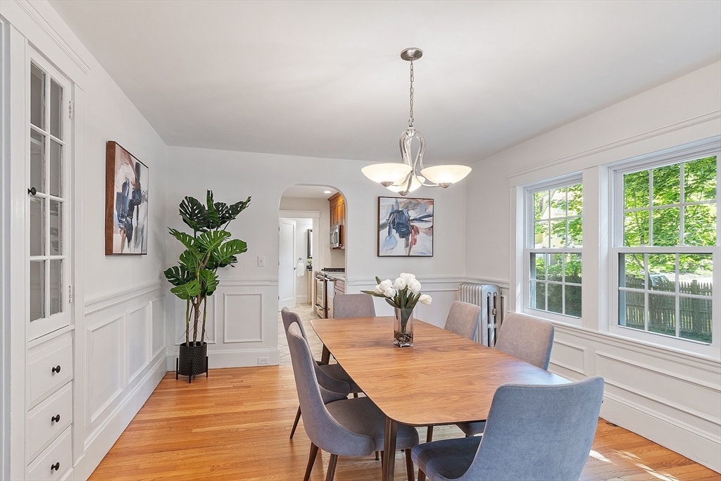 15 Marion Road Watertown, MA 02472 - Photo 10 of 41 a view of a dining room with furniture window and wooden floor