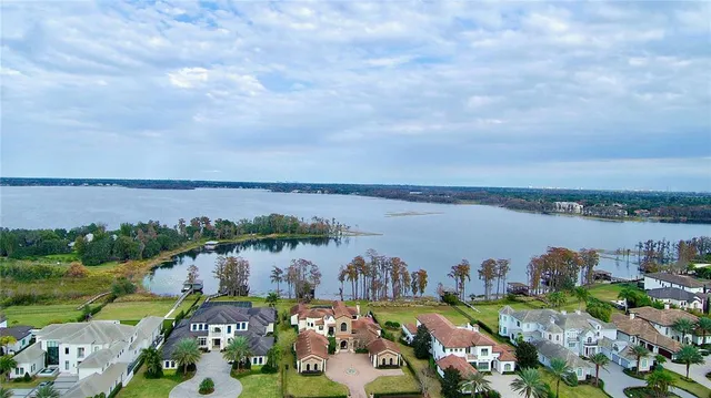 a view of a dining room with furniture wooden floor and a chandelier