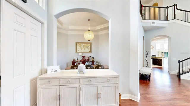 a kitchen with stove and cabinets