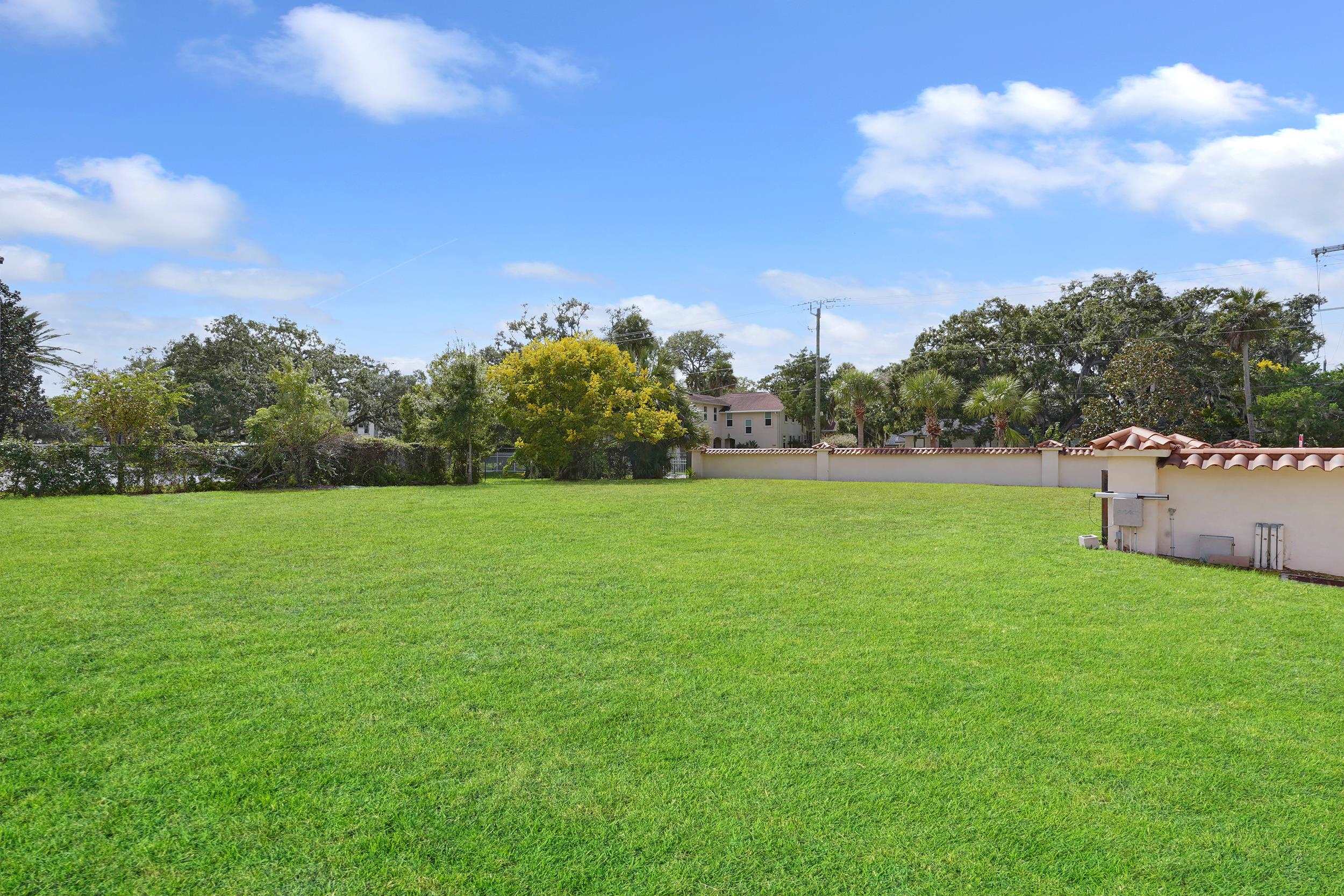 1 South Street, Unit A Baltimore, MD 21202 - Photo 15 of 30 a backyard of a house with lots of green space and trampoline