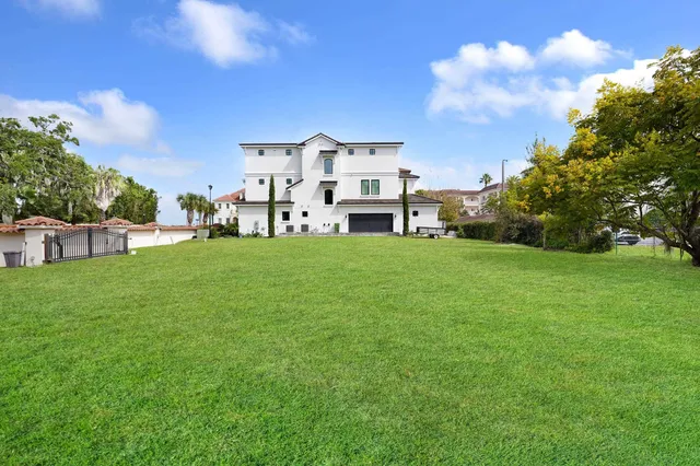 a view of a house with a big yard