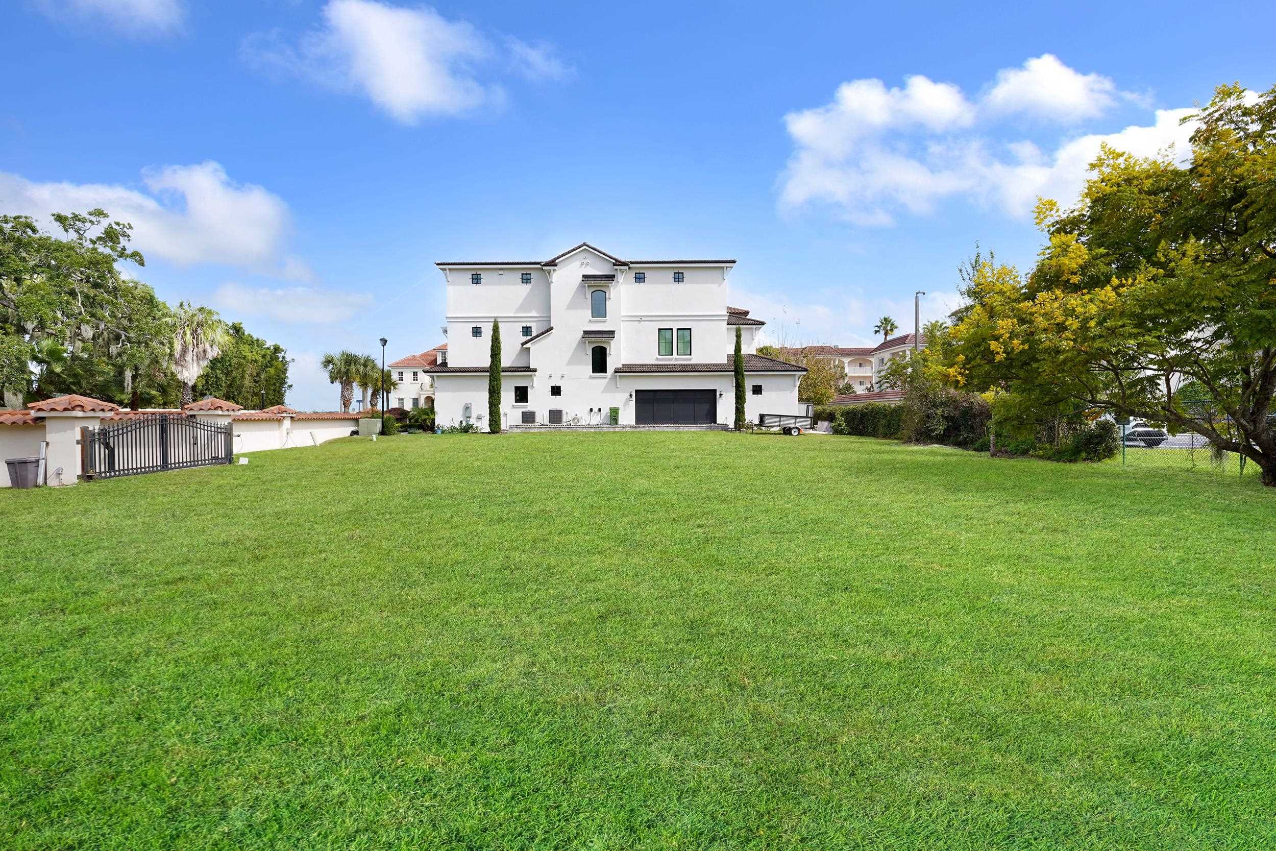 1 South Street, Unit A Baltimore, MD 21202 - Photo 18 of 30 a view of a yard with a house in the background