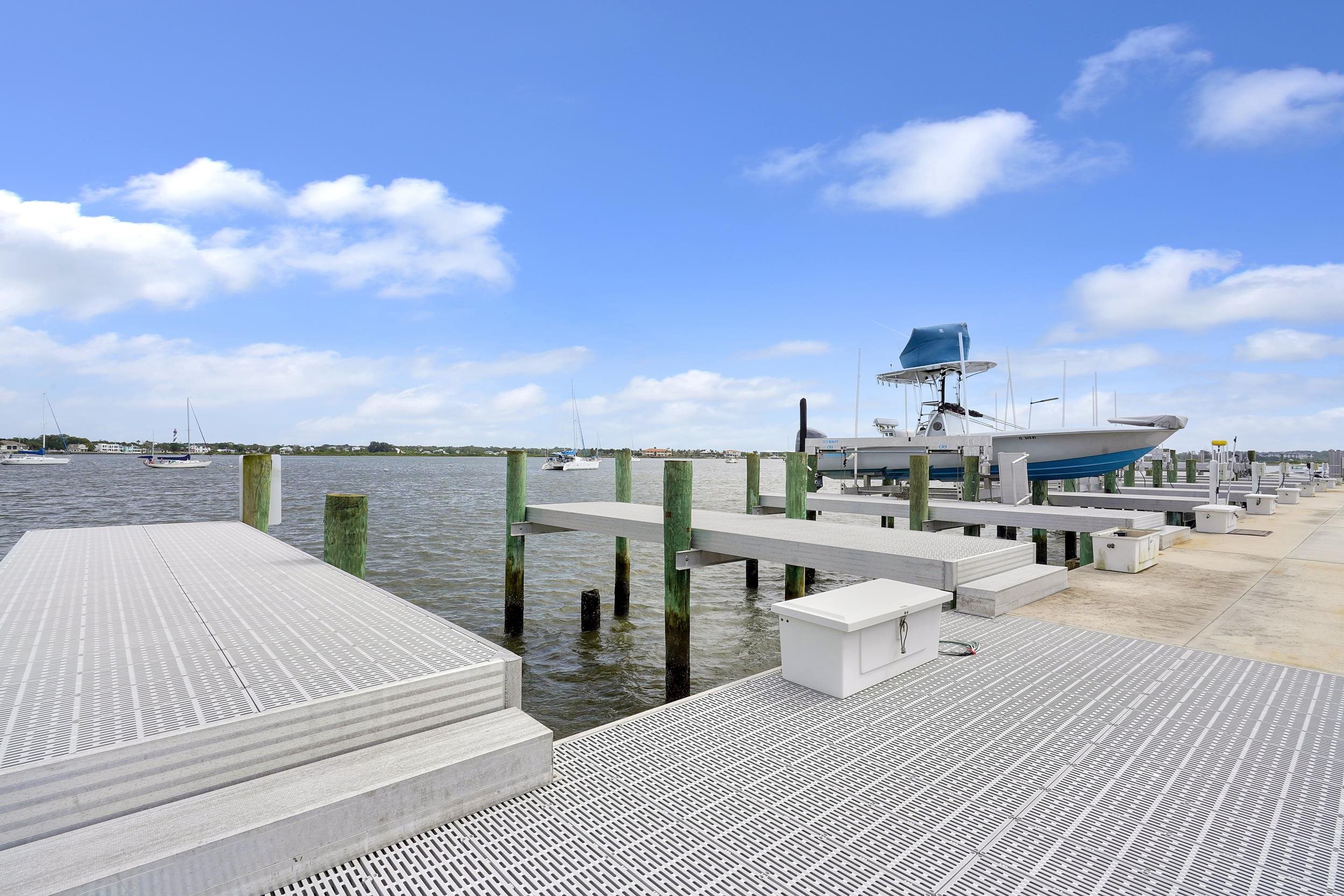 1 South Street, Unit A Baltimore, MD 21202 - Photo 23 of 30 a view of roof deck with a barbeque and wooden floor