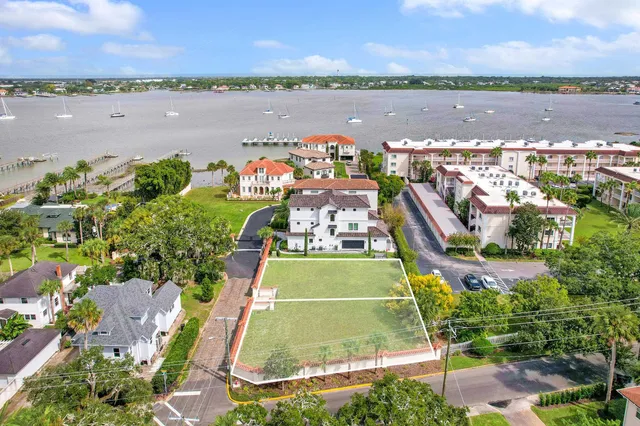 a backyard of a house with outdoor seating