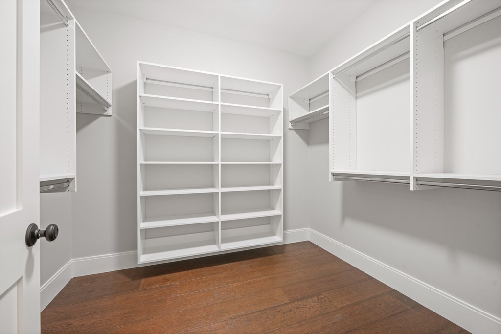 5 Wayside Road Natick, MA 01760 - Photo 16 of 29 a view of an empty room with a cabinet and a window