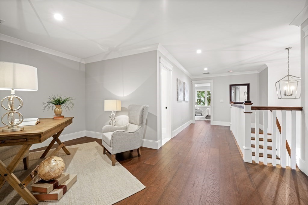 5 Wayside Road Natick, MA 01760 - Photo 19 of 29 a living room with furniture and a wooden floor