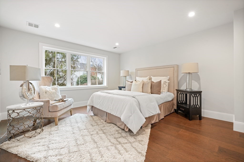 5 Wayside Road Natick, MA 01760 - Photo 23 of 29 a bedroom with a bed and a large window